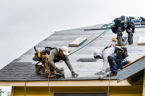 Professional Gutter Installation technician working in Roanoke, IN